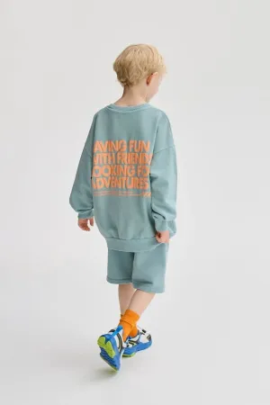 erkek cocuk arka yazili mavi oversize sweatshirt 5 15 yas