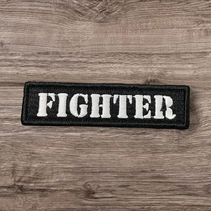 siyah zemin fighter savasci peci armasi