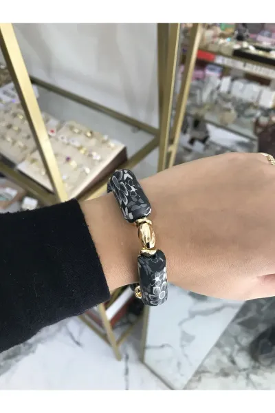 Siyah ve Gol Detaylı Lastikli Model Bileklik